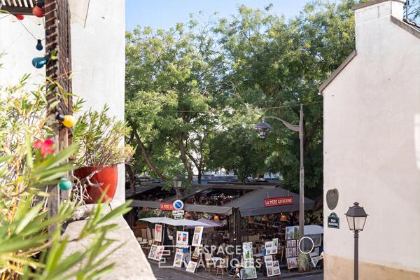 Appartement traversant avec deux terrasses et sauna – Place du Tertre