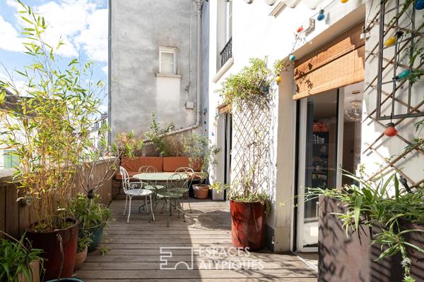 Appartement traversant avec deux terrasses et sauna – Place du Tertre