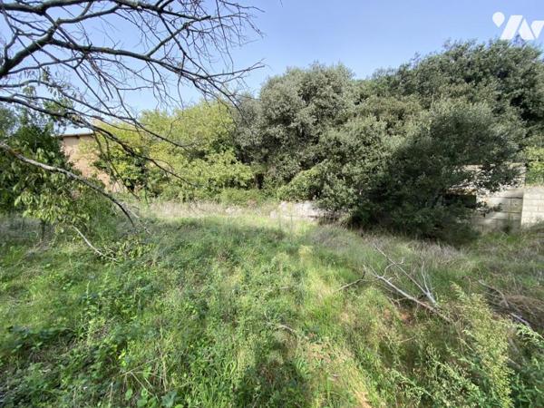  A 12 km d'UZES - Terrain à Bâtir - viabilité en bordure