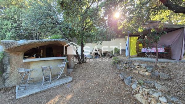 EXCLUSIVITÉ - TERRAIN AVEC HÉBERGEMENTS TROGLODYTES MEUBLÉS