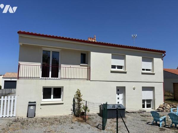 Maison divisée en deux logements
