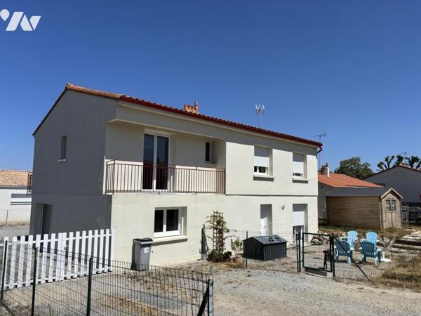 Maison divisée en deux logements