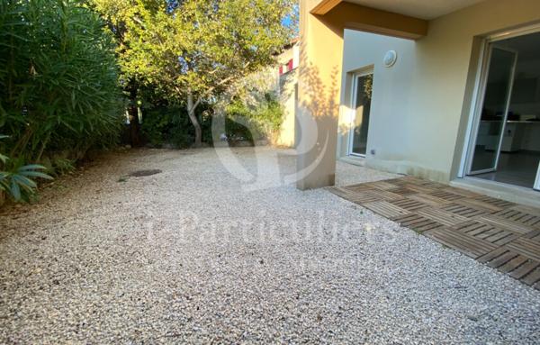 Appartement de type T3 avec jardin et stationnement