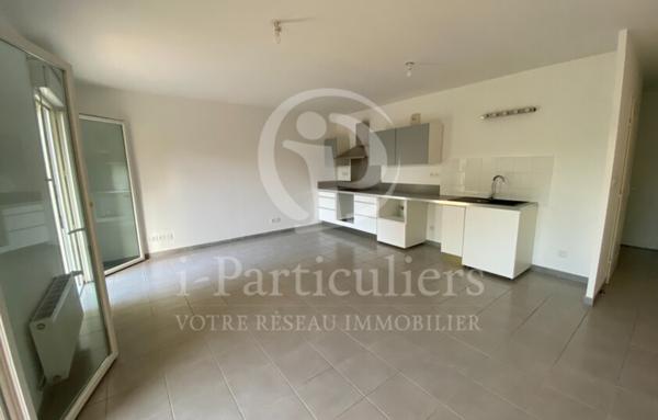 Appartement de type T3 avec jardin et stationnement