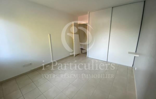 Appartement de type T3 avec jardin et stationnement