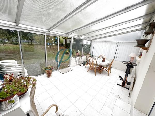 Maison avec jardin clos et garage dans un environnement calme sur Sucé sur Erdre.