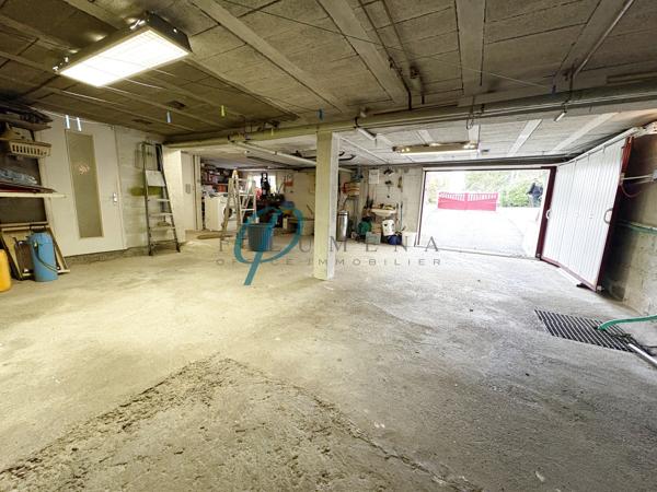 Maison avec jardin clos et garage dans un environnement calme sur Sucé sur Erdre.