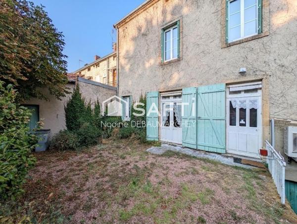 Maison de ville de caractère : beaux volumes, jardin et fort potentiel