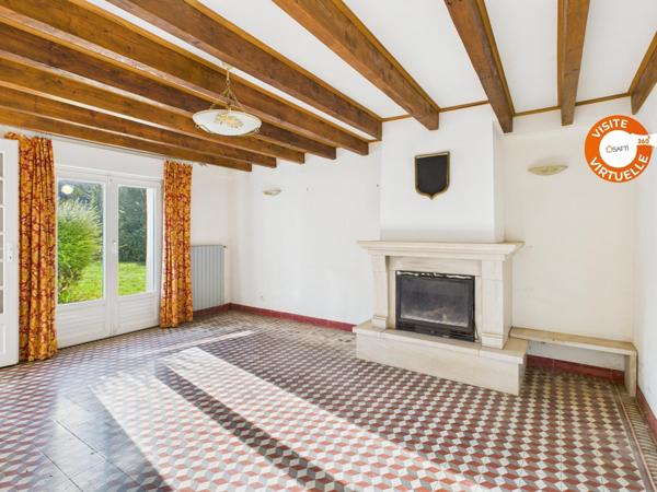 Grande maison familiale avec jardin clos et fort potentiel