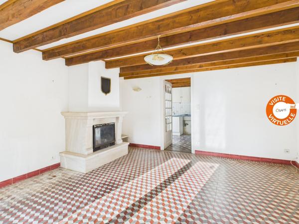 Grande maison familiale avec jardin clos et fort potentiel