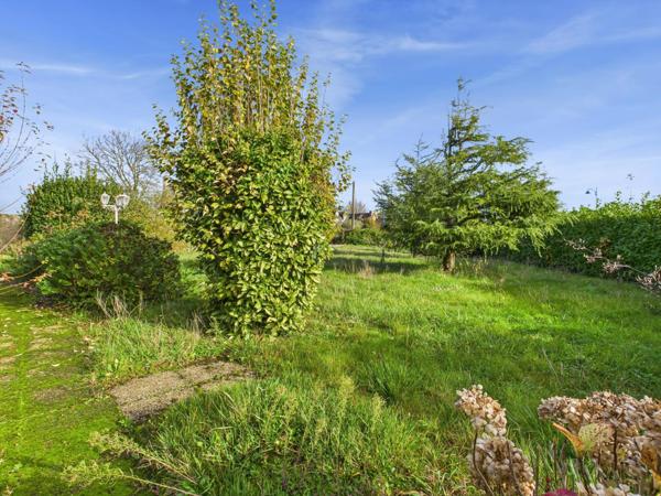 Grande maison familiale avec jardin clos et fort potentiel