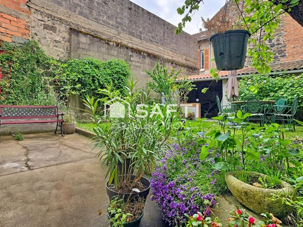 Maison de ville avec jardin !