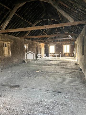 Immeuble locatif, situé à Loué -72540
