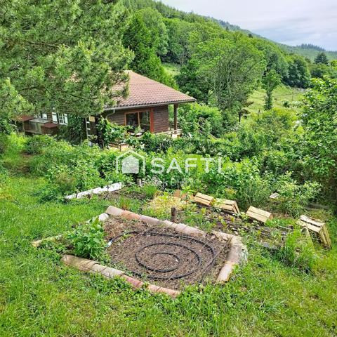 Chalet en bois avec vue panoramique sur les Alpes