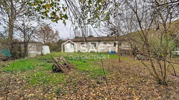 MAISON AU BEAU POTENTIEL AVEC BEAU TERRAIN BOISE