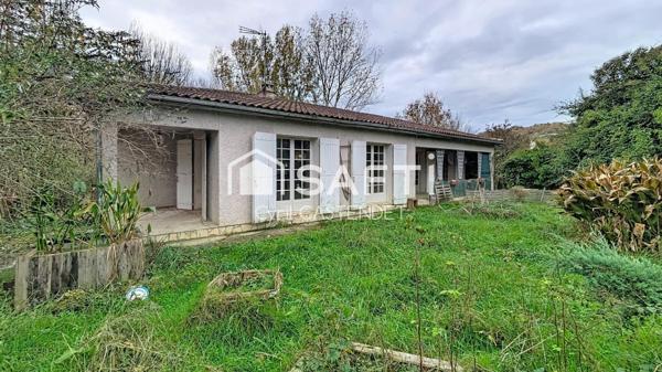 MAISON AU BEAU POTENTIEL AVEC BEAU TERRAIN BOISE