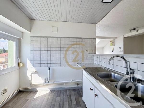 Appartement à vendre  3 pièces - 58 m 2   DANJOUTIN  - 90