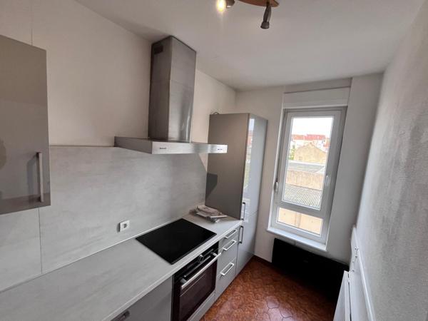 Appartement F2 44 m2 centre ville avec garage