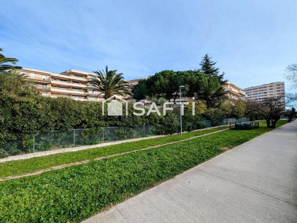 Appartement de type 4 avec terrasse en rez-de-chaussée, parking privatif, cave dans Résidence sécurisée avec piscine