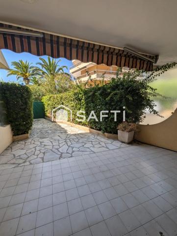 Appartement de type 4 avec terrasse en rez-de-chaussée, parking privatif, cave dans Résidence sécurisée avec piscine
