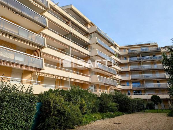 Appartement de type 4 avec terrasse en rez-de-chaussée, parking privatif, cave dans Résidence sécurisée avec piscine