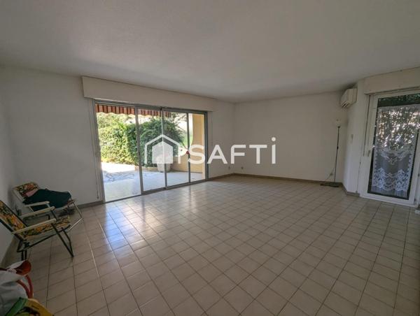 Appartement de type 4 avec terrasse en rez-de-chaussée, parking privatif, cave dans Résidence sécurisée avec piscine