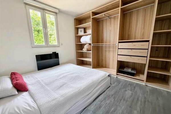 Appartement F2 en rez-de-chaussée avec cave et place de parking