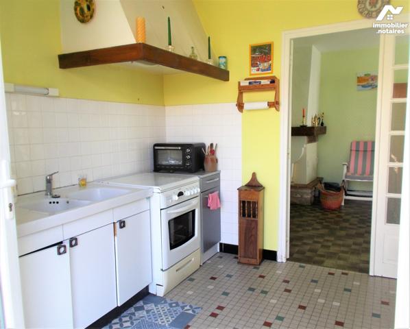 En centre-ville, au calme, jolie maison de plain-pied avec jardin sur 304 m2