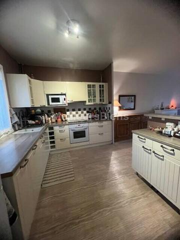 Pavilon individuel 105 M2 environ 3 chambres avec jardin.