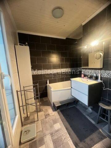 Pavilon individuel 105 M2 environ 3 chambres avec jardin.