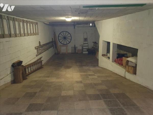 A VENDRE A SAINT MARTIN D'ABLOIS - MAISON DE VILLAGE AVEC TERRASSE ET GARAGE