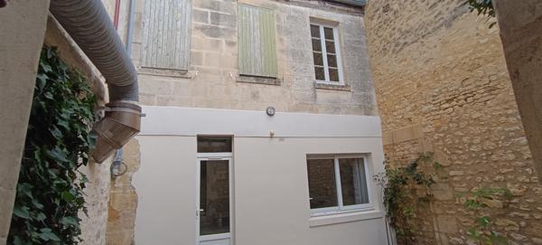 Immeuble avec local commercial - appartements