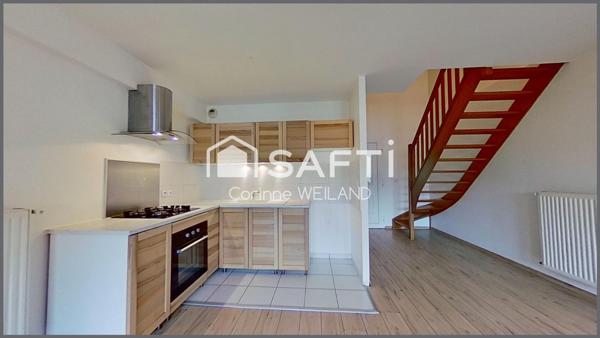 Magnifique duplex dans petite copropriété, DPE C, 2 chambres, grande terrasse, garage. Centre ville