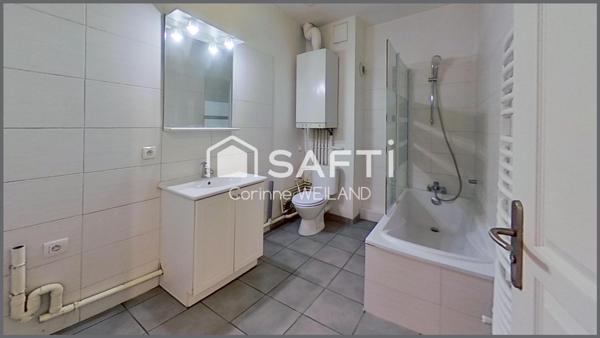 Magnifique duplex dans petite copropriété, DPE C, 2 chambres, grande terrasse, garage. Centre ville