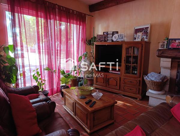 Grande maison trois chambres