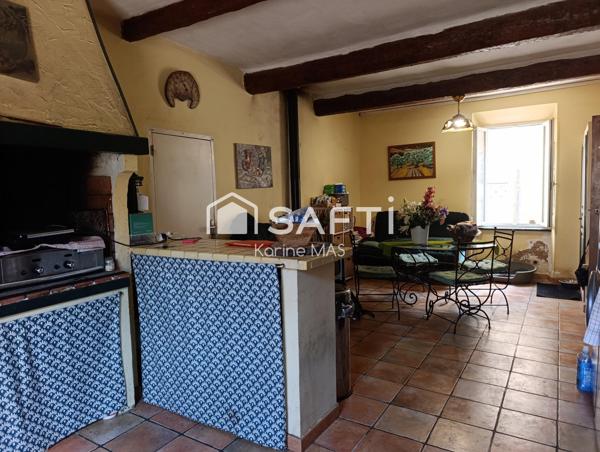 Grande maison trois chambres