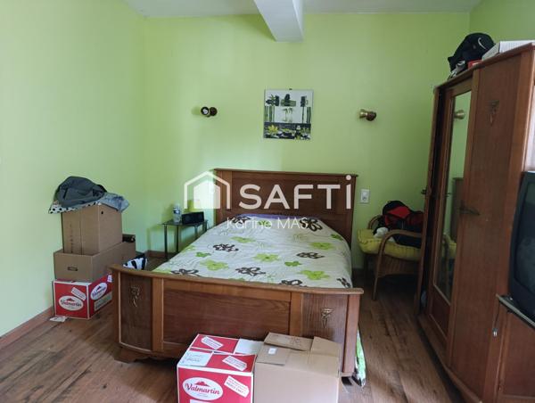 Grande maison trois chambres