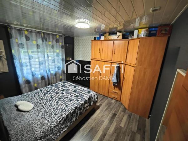 Maison de plain-pied à Didenheim sur terrain de 7,04 ares avec sous-sol aménagé