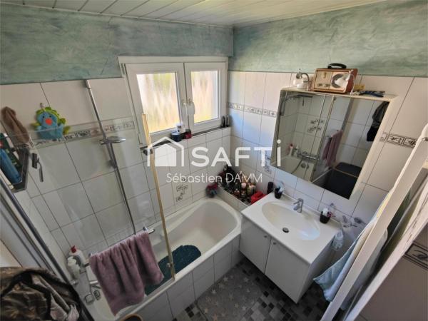 Maison de plain-pied à Didenheim sur terrain de 7,04 ares avec sous-sol aménagé