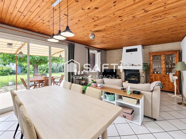Maison avec jardin, terrasse couverte et annexes