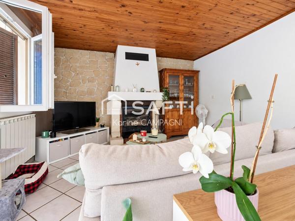 Maison avec jardin, terrasse couverte et annexes