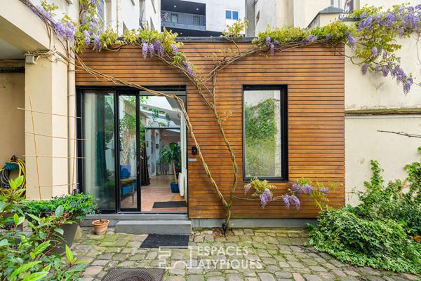 Ancienne boutique sur cour transformée en maison de ville