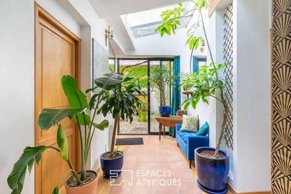 Ancienne boutique sur cour transformée en maison de ville