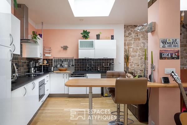 Ancienne boutique sur cour transformée en maison de ville