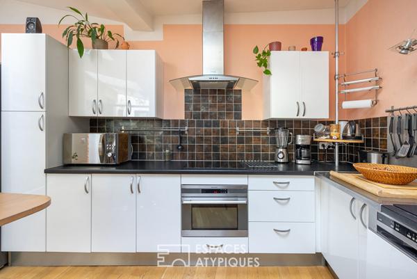 Ancienne boutique sur cour transformée en maison de ville