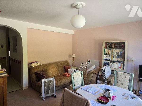 Appartement 3 pièces de 70,79 m2 avec balcon, garage et cave.