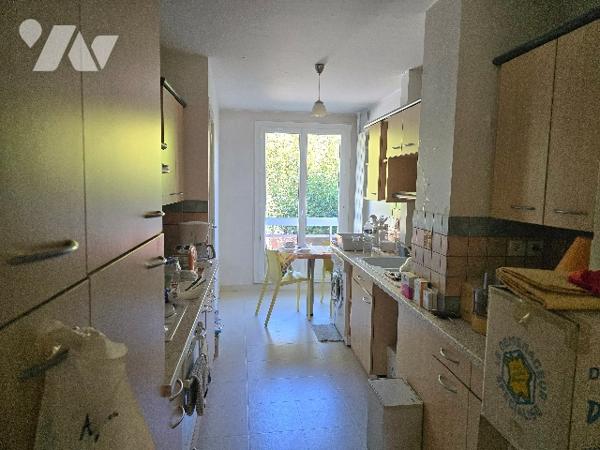 Appartement 3 pièces de 70,79 m2 avec balcon, garage et cave.