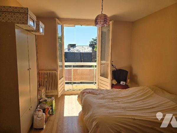 Appartement 3 pièces de 70,79 m2 avec balcon, garage et cave.