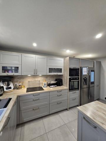 Maison 4 chambres avec garage et terrain clos