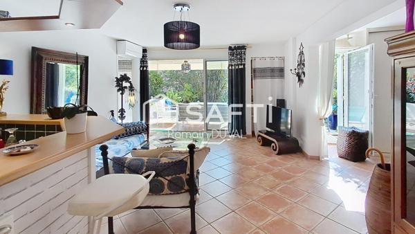 Appartement T2 bis en rez-de-jardin avec terrasse et aperçu mer